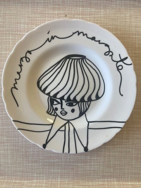 girl in hat plate